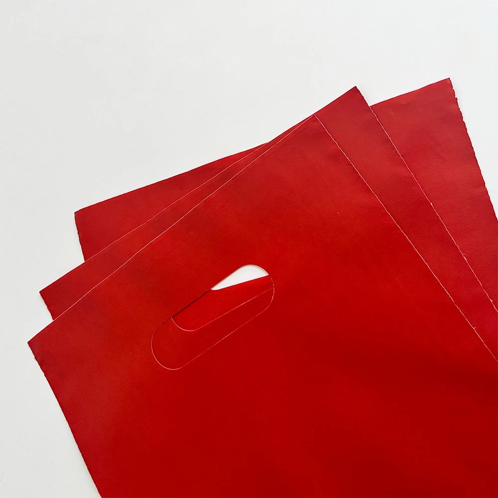 punched handle carrier bags punched handle carrier bags